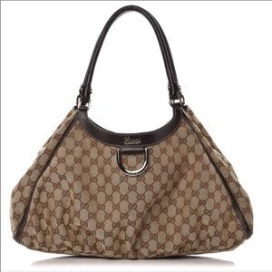 Gucci monogram gold D bag